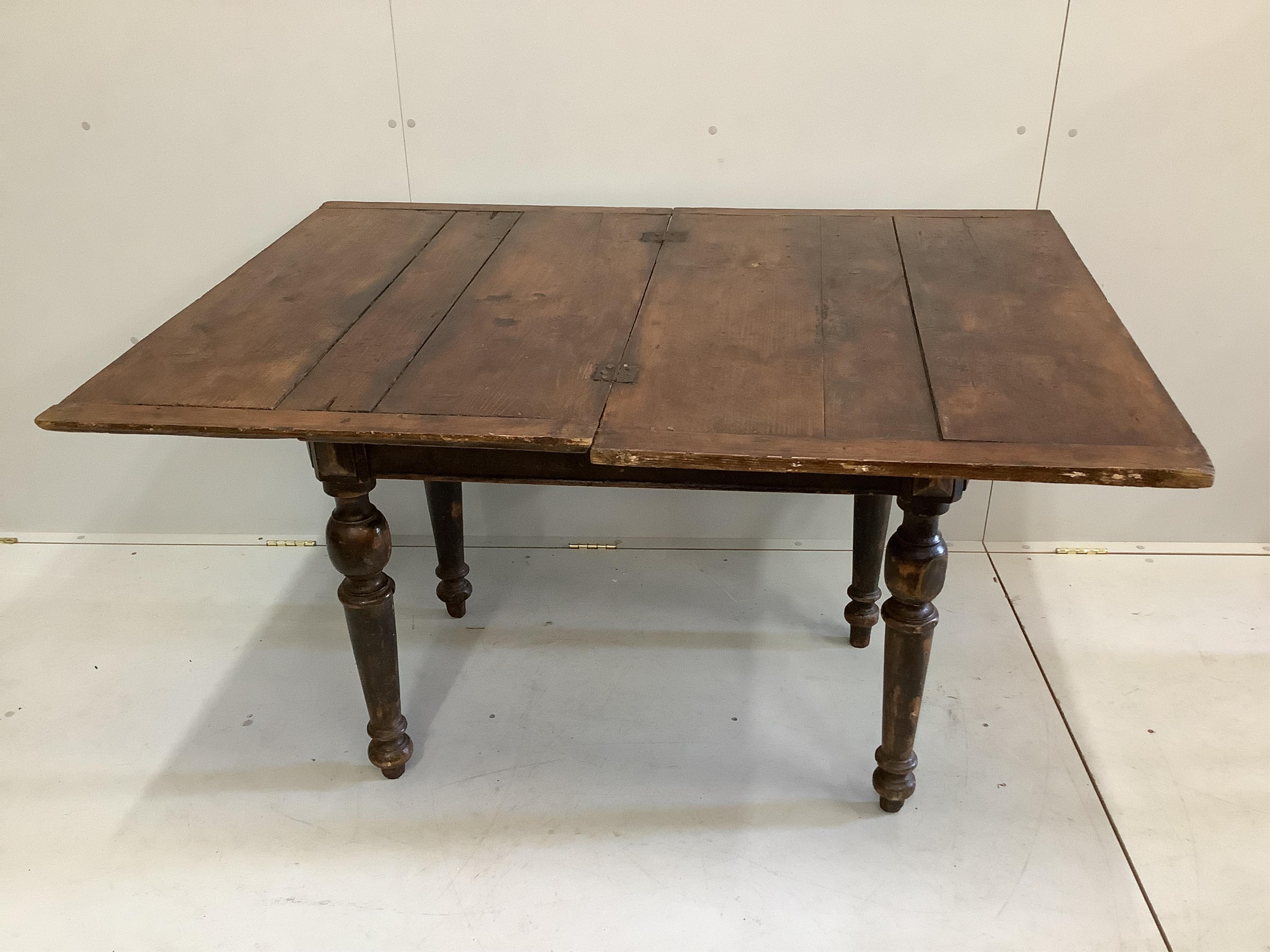 A Continental pine folding kitchen table, width 100cm, depth 67cm, height 79cm